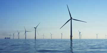 Wind turbines in the ocean.