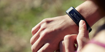 Person using a smart band.