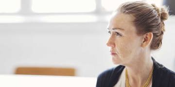 Woman looking to the side.