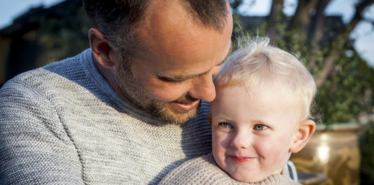 Father and his child smiling