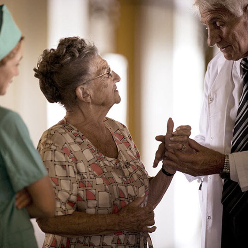 Doctor and nurse with woman