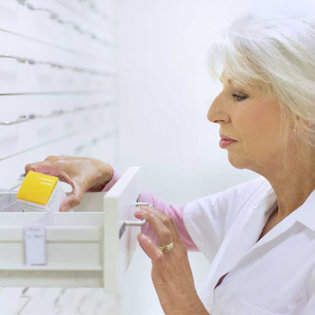 pharmacist-searching-medicine A pharmacist searching for medicine